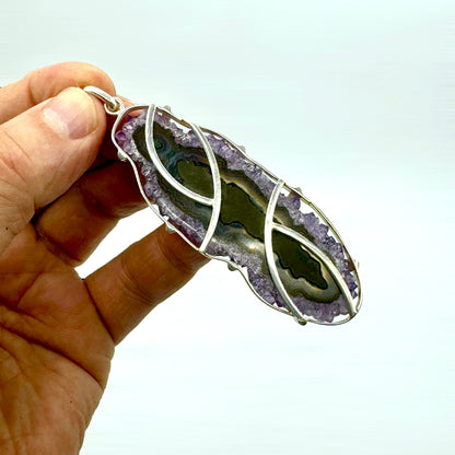 Amatista rodaja colgante en plata de ley