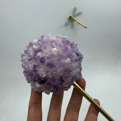 Amethyst in bronze and onyx base