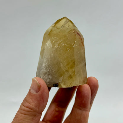 Citrino natural pulido 245 g.