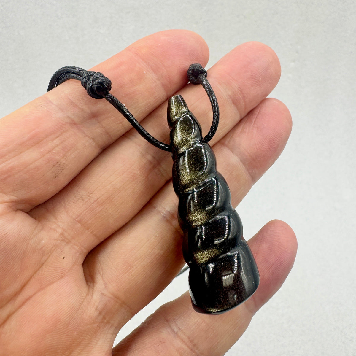 Obsidiana dorada caracola colgante Munay Minerales Mallorca
